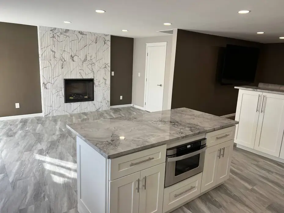 Quartz waterfall island countertop in modern kitchen Bellevue WA