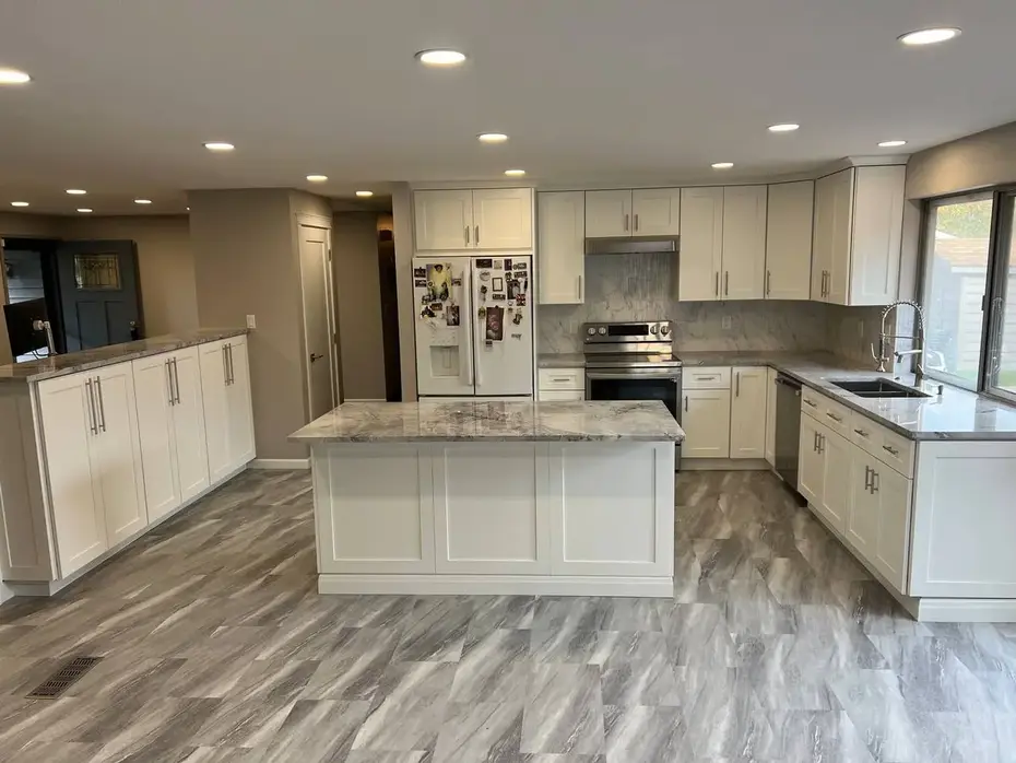 Marble-look quartz countertops with gray Shaker cabinets Seattle
